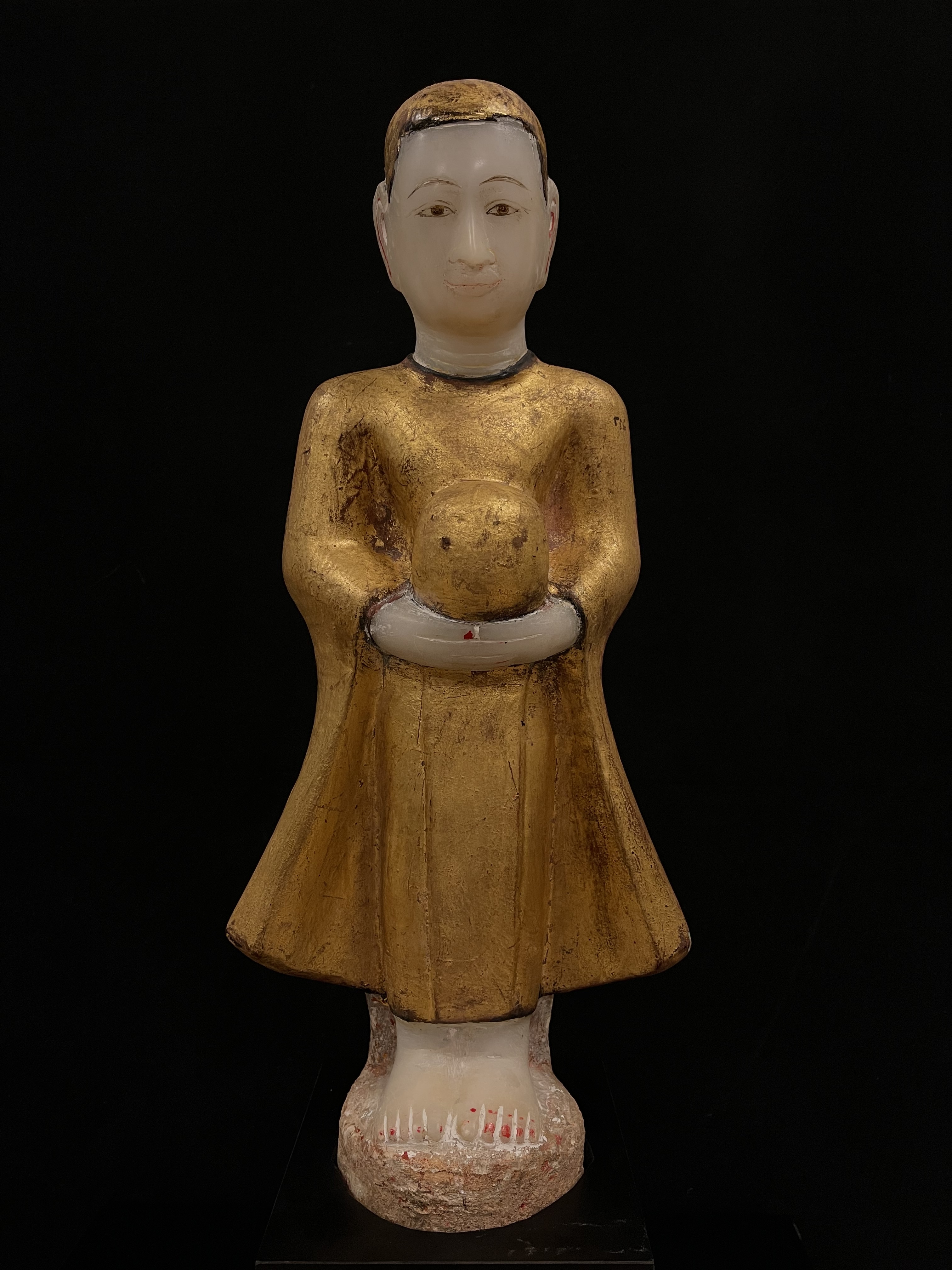 Gilded lacquer marble standing monk with an alm bowl- 6393